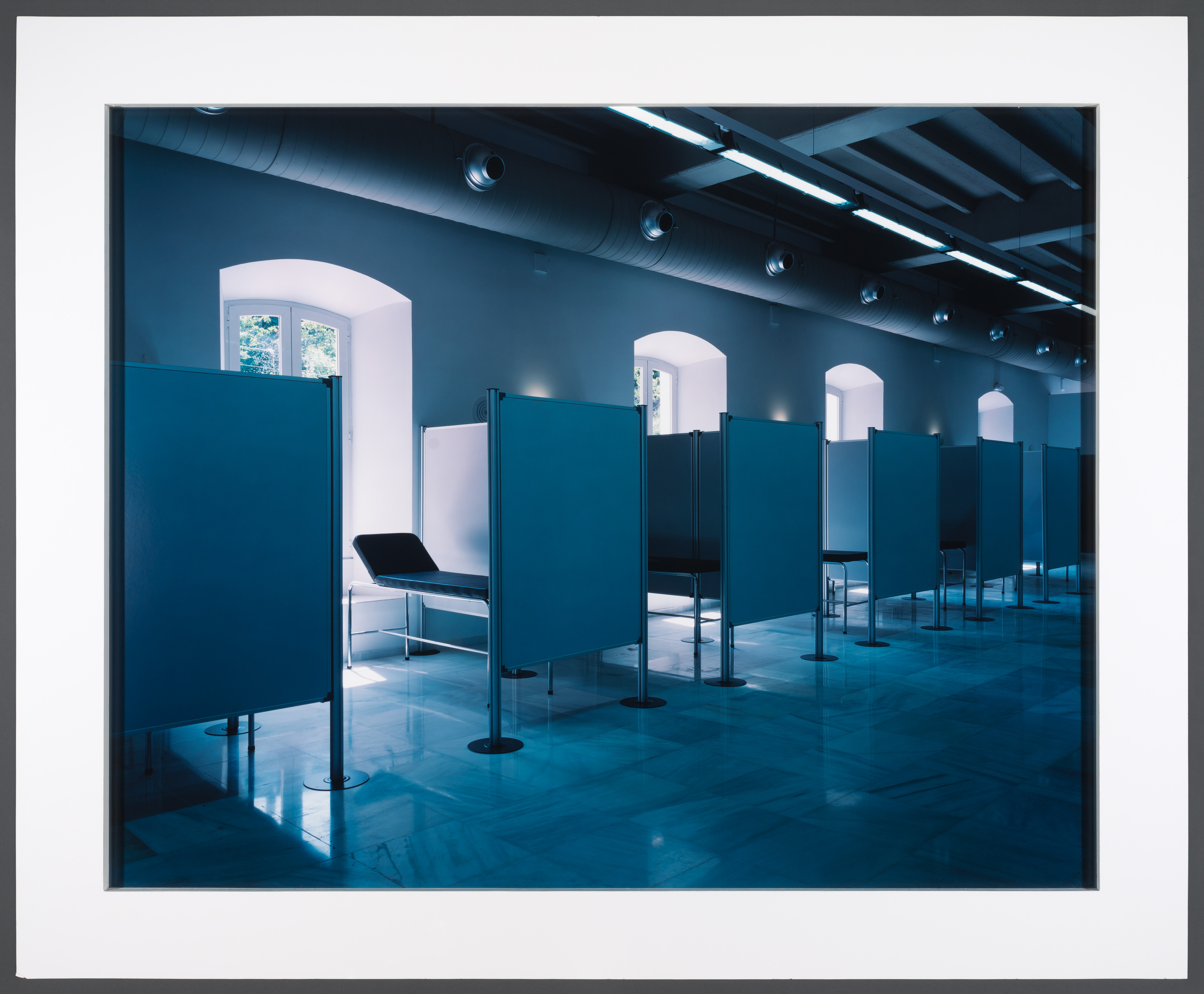Photograph intitled “Spa [Blue Bays and Windows]”, 2001, by Lynne Cohen, certified in 2018, Canadian Centre for Architecture © Estate of Lynne Cohen